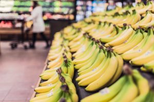 Picture of bananas in a grocery store.